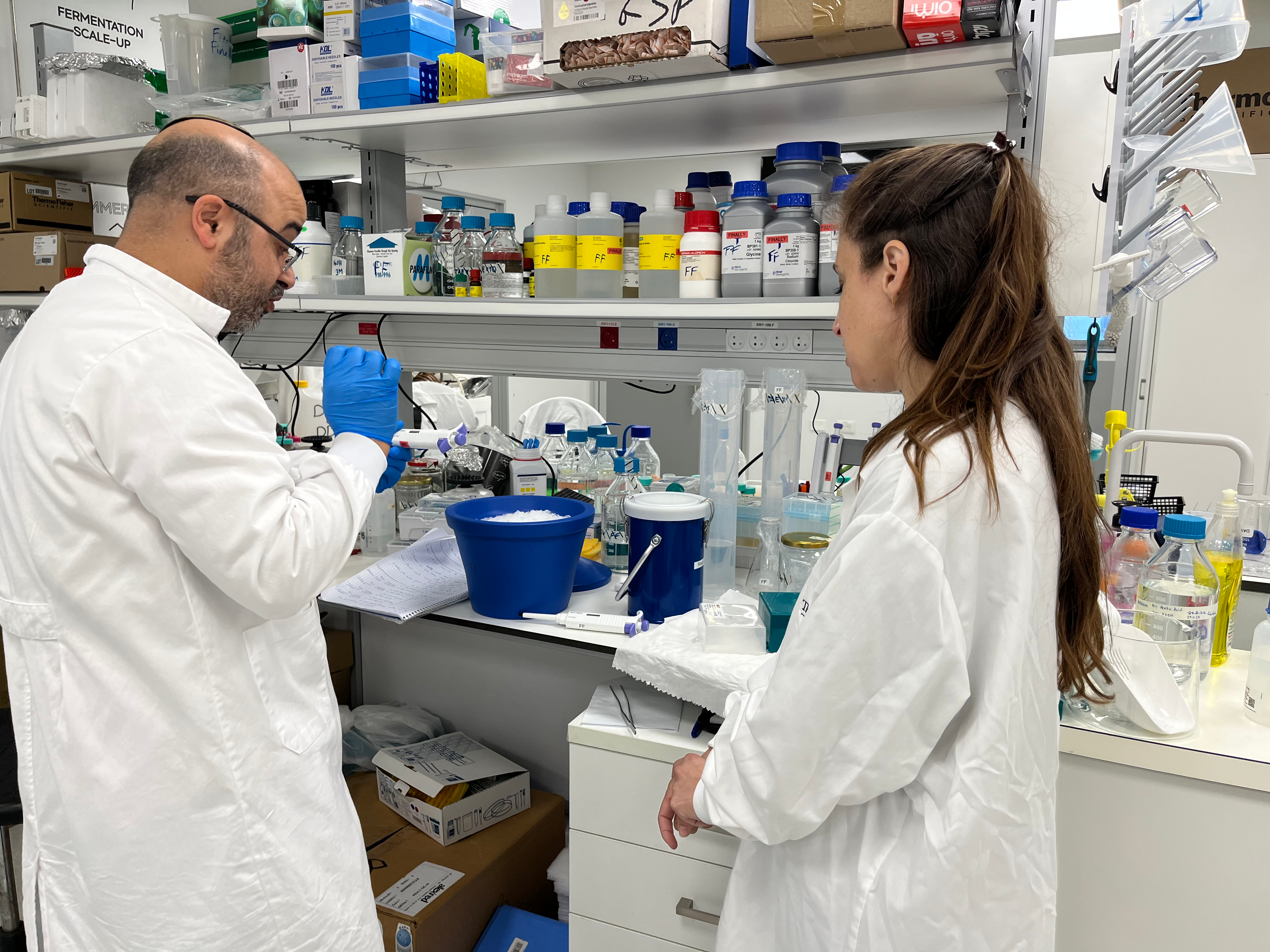 Scientists working on fermentation scale-up in an Israeli foodtech lab